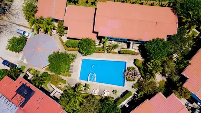 an overhead view of a swimming pool in a resort at Casa Verde 2b2b Completely Renovated Ground Unit in Coco