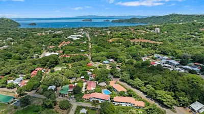 an aerial view of a town with trees and water at Casa Verde 2b2b Completely Renovated Ground Unit in Coco