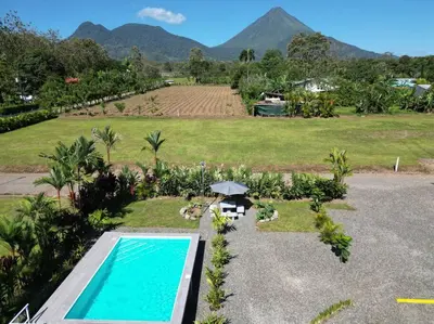 an aerial view of a resort with a swimming pool at Villa Margarita - Families Getaway in La Fortuna in Fortuna