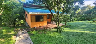 a tiny house in the middle of a field at Hermosa cabaña con espacios al Aire Libre! in San Francisco