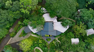 an aerial view of a house in the middle of a forest at Tocu Tent Camp in Caño Negro