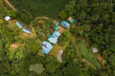 an overhead view of a farm with buildings and trees at Finca Anjala - Architectural lodge on sustainable in Ojochal