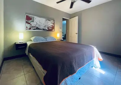 a bedroom with a large bed in a room at Casa de Romá in Coco