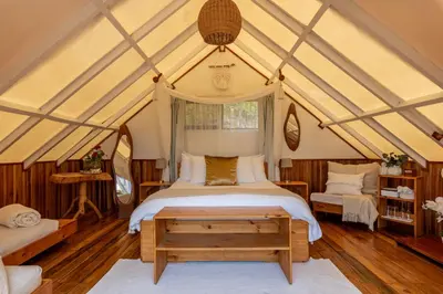 a bedroom with a bed in a tent at Monteverde Alas Glamping in Monteverde Costa Rica