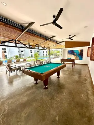 a billiard room with a pool table in it at Viva in Jacó