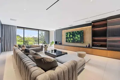 a living room with a large couch and a table at Luxurious Villa in Papagayo in Nacascolo