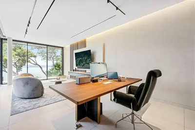 an office with a desk with a computer and a chair at Luxurious Villa in Papagayo in Nacascolo