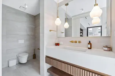 a bathroom with a toilet and a sink and a mirror at Luxurious Villa in Papagayo in Nacascolo