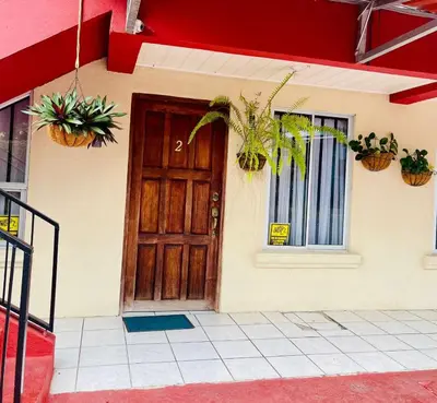 a door of a house with potted plants on it at Sweet Home Carrion 2 y 3 in Fortuna
