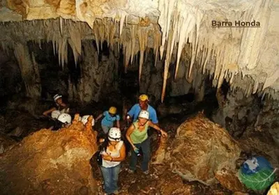 a group of people in a cave with ice formations at Nosara Hideaway 2 - BREAKFAST PROVIDED & Mountain View Cabins in Nicoya