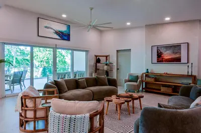 a living room with a couch and chairs at Esterillos Lote home in Esterillos