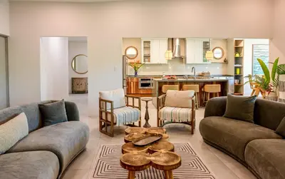 a living room with a couch and a table at Esterillos Lote home in Esterillos