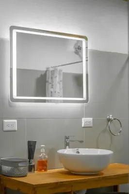 a bathroom with a white sink and a mirror at Pizote Apartment Monteverde 2nd floor in Monteverde Costa Rica