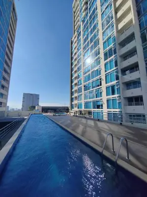 a body of water in a city with tall buildings at Elegante apartamento en ciudad in San José