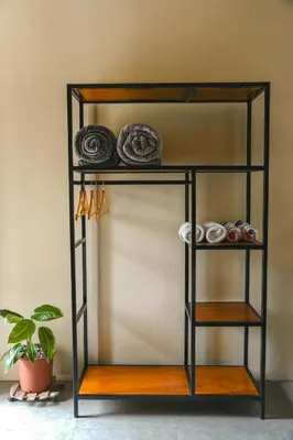 a shelf with plates and other items on it at Bamboo River Lodge in Horquetas