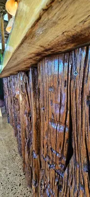 a close up of a piece of wood on a table at Bonding Coffee Roaster Café & Hotel in Quepos