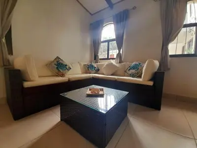 a living room with a couch and a coffee table at Casa BEA 1 in Sámara