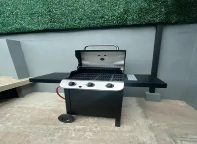 a model of a miniature stove with a laptop on it at Casa Tusi - 2 Blocks From Clubs & Strip in Jacó