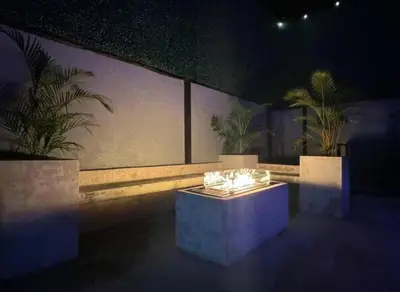 a room with a table and some plants in it at Casa Tusi - 2 Blocks From Clubs & Strip in Jacó