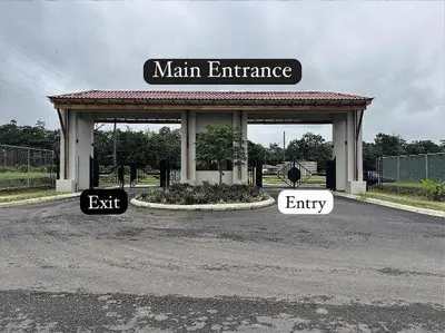 a main entrance to a main entrance exit and entry signs at Casa Cristal # 1 in Fortuna