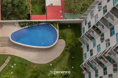 an overhead view of a swimming pool on a building at Bloum at 22, City Views and Wonderland Vibes! in Hatillo