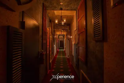 a long hallway with a red and green carpet at Grotto at 28, City Views and Wonderland Vibes! in Hatillo