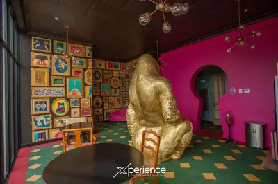 a room with a statue in a room with pink walls at Grotto at 28, City Views and Wonderland Vibes! in Hatillo