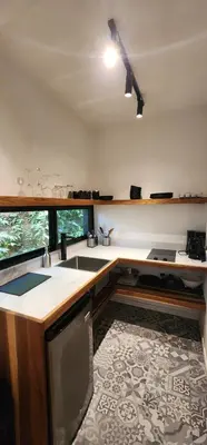 a kitchen with a sink and a counter top at Hotel Evasión in Ojochal