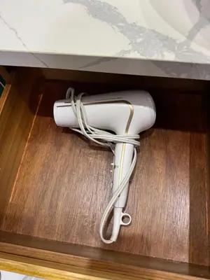 a white wii controller in a drawer at Casa Rucca in Uvita