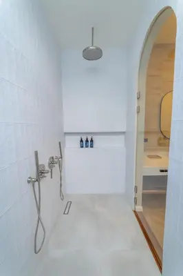 a bathroom with a shower and a sink at Luxury villa on the Cloud Forest Infinity Pool in Monteverde Costa Rica