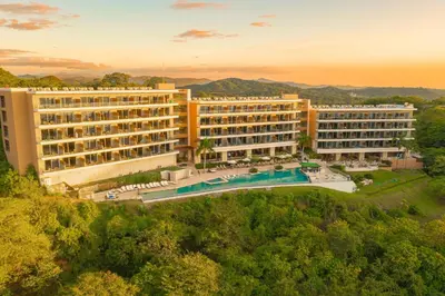 an aerial view of a hotel with a resort at Wyndham Tamarindo in Tamarindo
