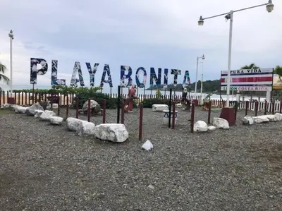 a park with rocks and a sign that says play room at Ocean view Apartment in Puerto Limón