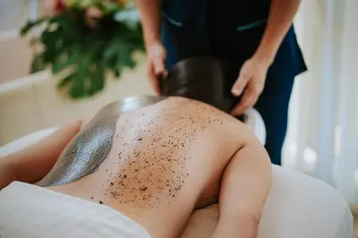 a woman getting a hair cut with a brush at Vista Suites at Parador - Adults Only in Manuel Antonio