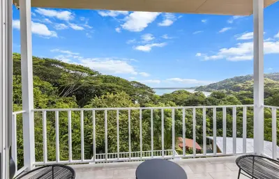 a view from the balcony of a house at casa amor del sol apartment #1 in Quebrada Ganado
