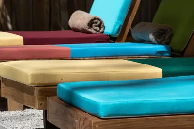 a group of three mattresses sitting next to each other at The Beach Break Surf Hotel in Nosara