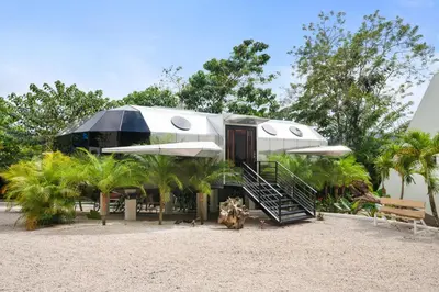 a pod house on the beach with palm trees at Blue Ridge Retreat in Potrero