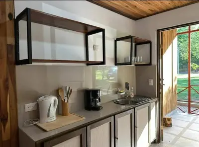 a kitchen with a sink and a counter top at Casa Elora in Bagaces