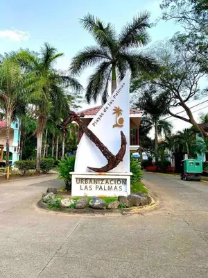 a sign for the university of las palmas with a palm tree at Coco Sunset Hills #42 in Coco