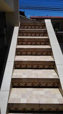 a set of stairs leading up to a building at Morada Kampos in Heredia