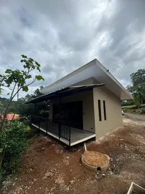 a small white building with a roof at Villa Colibrí a solo 5mins de Playa Carrillo in Hojancha
