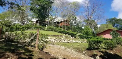 a house on the side of a hill at Cabana Luna in Jicaral