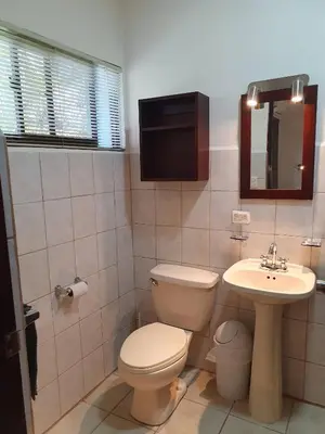 a bathroom with a toilet and a sink at Apartment hotel Marina Loft 207 in Coco