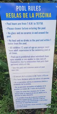 a sign for the pool rules in la piscina at Apartment hotel Marina Loft 207 in Coco