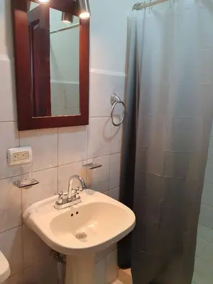 a bathroom with a sink and a shower at Marina Loft Condos 223 in Coco