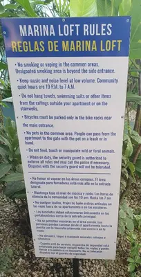 a sign that says marina lot rules revision be marina lot at Marina Loft Condos 223 in Coco