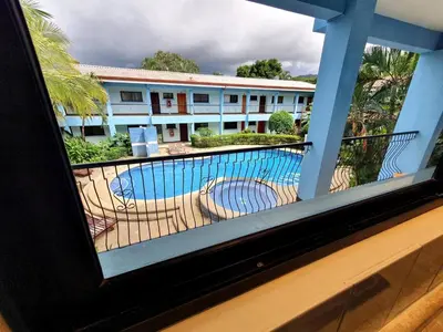 a view of a pool from a window of a hotel at Marina Loft Condos 223 in Coco