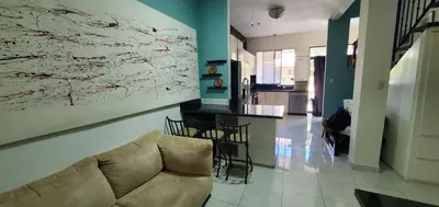 a living room with a couch and a kitchen at Vista perfecta dos ap 8 in Artola