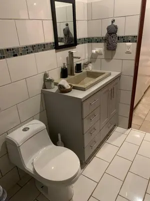 a bathroom with a toilet and a sink at Villa Del Mar 3 Spectacular ocean view in Savegre