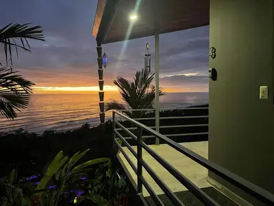 a view of the ocean from a house balcony at Villa Del Mar 3 Spectacular ocean view in Savegre