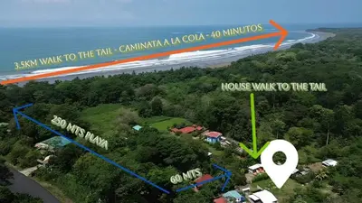 a map of a house on a hill next to a road at Bahia Ballena Walk to the Beach Uvita Apartments in Uvita